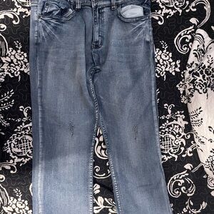 Light Blue Bootcut Jeans with High Waist and Faded Wash